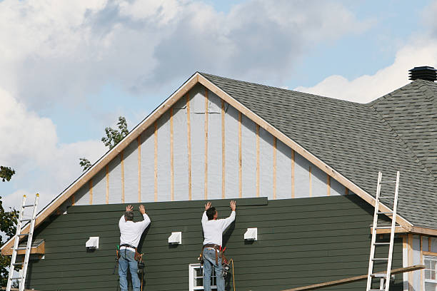 Professional Siding technician working in Marion, KY